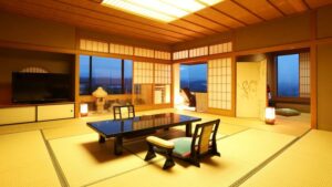 低いテーブルと座椅子のある畳の部屋