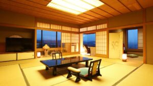 低いテーブルと座椅子のある畳の部屋