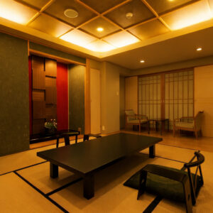 Camera in tatami con tavolo basso e sedie