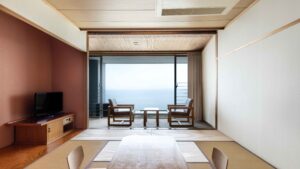 Tatami room with chairs and table by ocean view