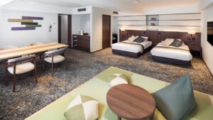 Guest room with two beds and tatami seating area