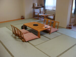 Tatami room with low table and floor chairs