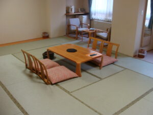 Tatami room with low table and floor chairs