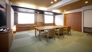 Tatami room with table and chairs seating area
