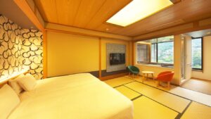Bedroom with large beds and tatami seating area