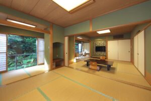 Tatami guest room with low table and window seating area