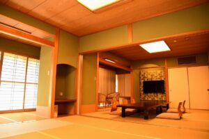 Tatami room with low table and floor chairs