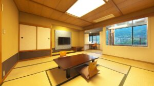 Tatami room with low table and floor chairs