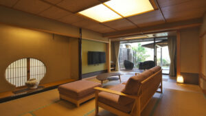 Tatami room with sofa, chairs, and low table