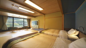 Twin beds in a tatami guest room