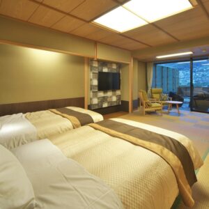 Twin beds in a tatami-style guest room