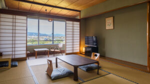 Tatami room with low table and chairs by window