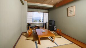 Tatami room with low table and floor chairs