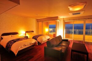Twin beds and sofa in a guest room