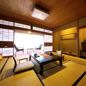 Tatami room with low table and chairs