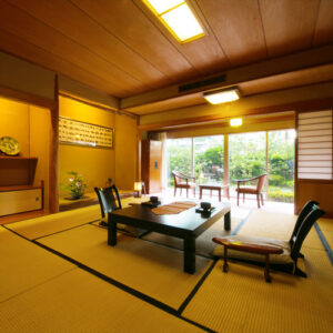 Tatami room with low table and chairs