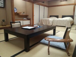 Tatami room with low table and twin beds