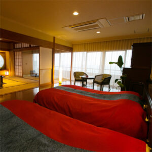 Twin beds in a tatami guest room