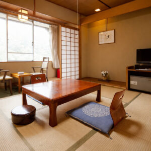 Chambre en tatami avec table basse et chaise de sol