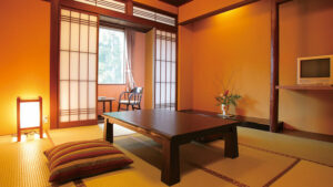 Habitación de tatami con mesa baja y cojines de suelo