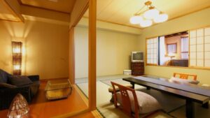 Tatami room with low table, floor chairs, and sofa