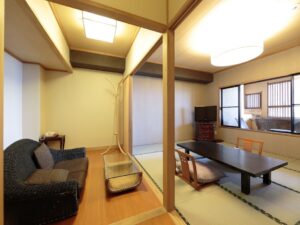Tatami seating area with low table and sofa