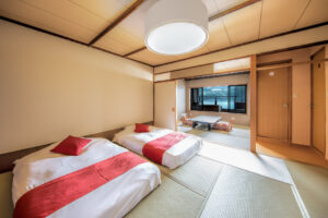Two beds in a tatami guest room
