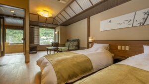 Twin beds in a Japanese-style guest room