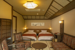 Twin beds in a tatami guest room