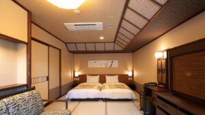 Twin beds in a tatami-style guest room
