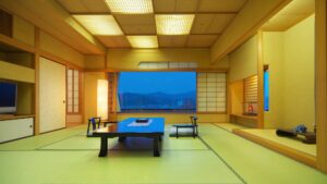 Habitación de tatami con mesa baja y asientos en el suelo