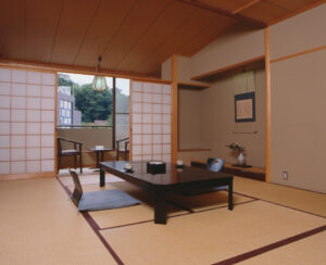 Tatami room with low table and floor chairs