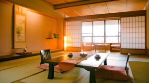 Habitación de tatami con mesa baja y cojines de suelo