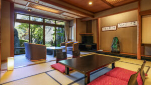 Tatami room with low table and chairs by window