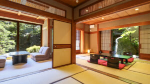 Tatami room with low table and garden seating area