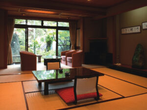 Tatami room with low table and lounge chairs