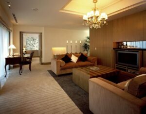 Living room with sofas, coffee table, and desk