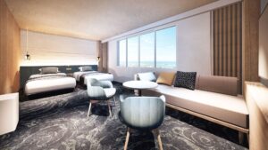 Lits jumeaux et coin salon dans une chambre moderne
