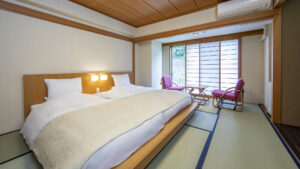 Twin beds in a tatami guest room