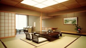 Chambre en tatami avec table basse et chaises de sol
