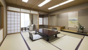 Chambre en tatami avec table basse et chaises de sol