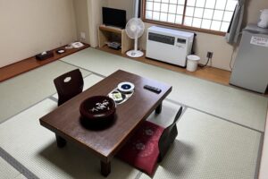 Tatami room with low table and floor chairs