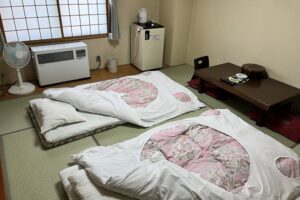 Two futon beds in a tatami guest room