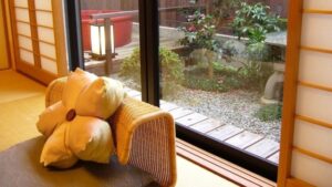 Floor chair with cushions by the window
