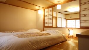 Japanese-style room with futon bedding on tatami