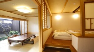 Japanese-style room with low table and two beds