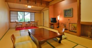 Tatami guest room with low table and chairs