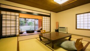 Tatami guest room with low table and floor cushions