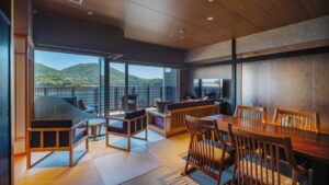 Tatami room with table, chairs, and balcony seating