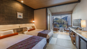 Twin beds in tatami room with balcony seating